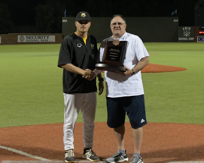 PHSC Head Coach Coleman Accepts NJCAA DII Trophy